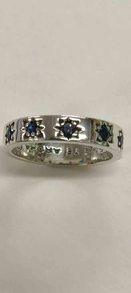 Sterling silver with five star set sapphire with inscription. “me te aroha ( with love or and love )”